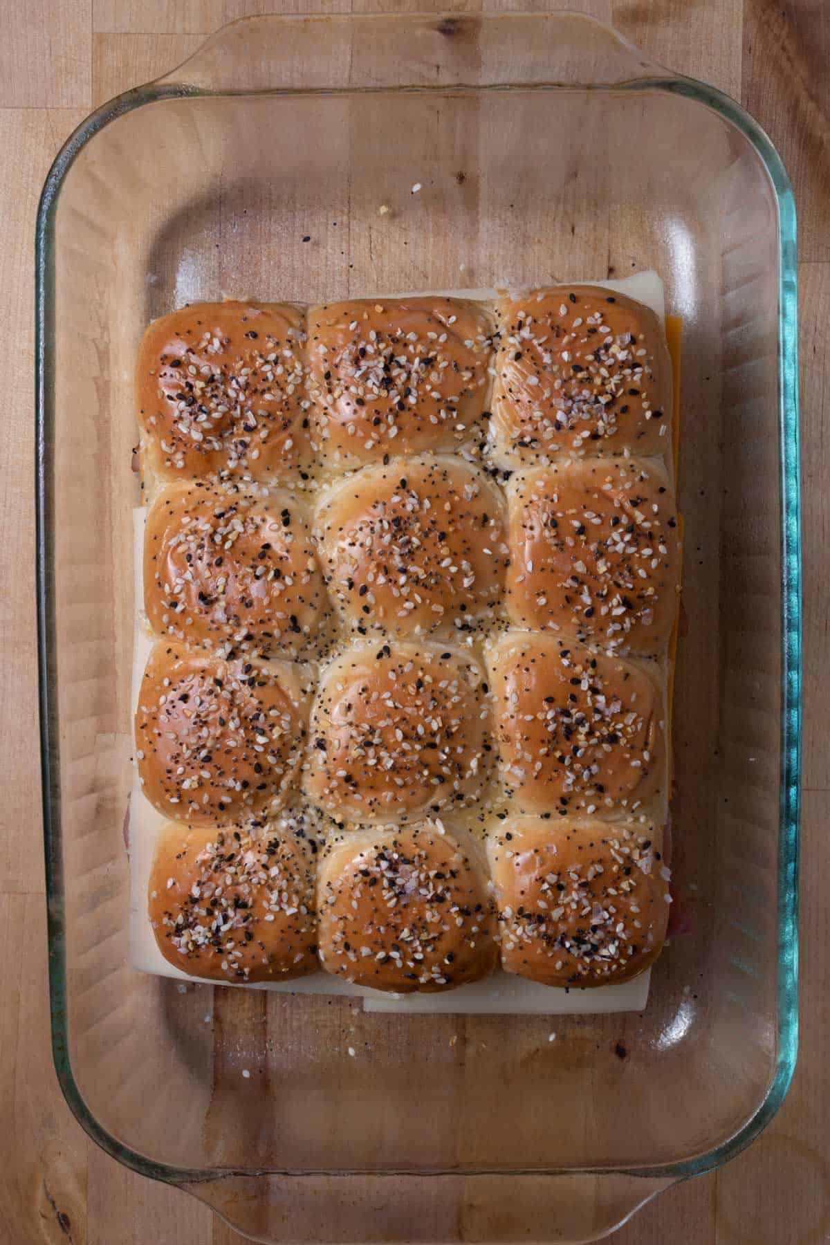Hawaiian roll sliders with everything bagel seasoning.