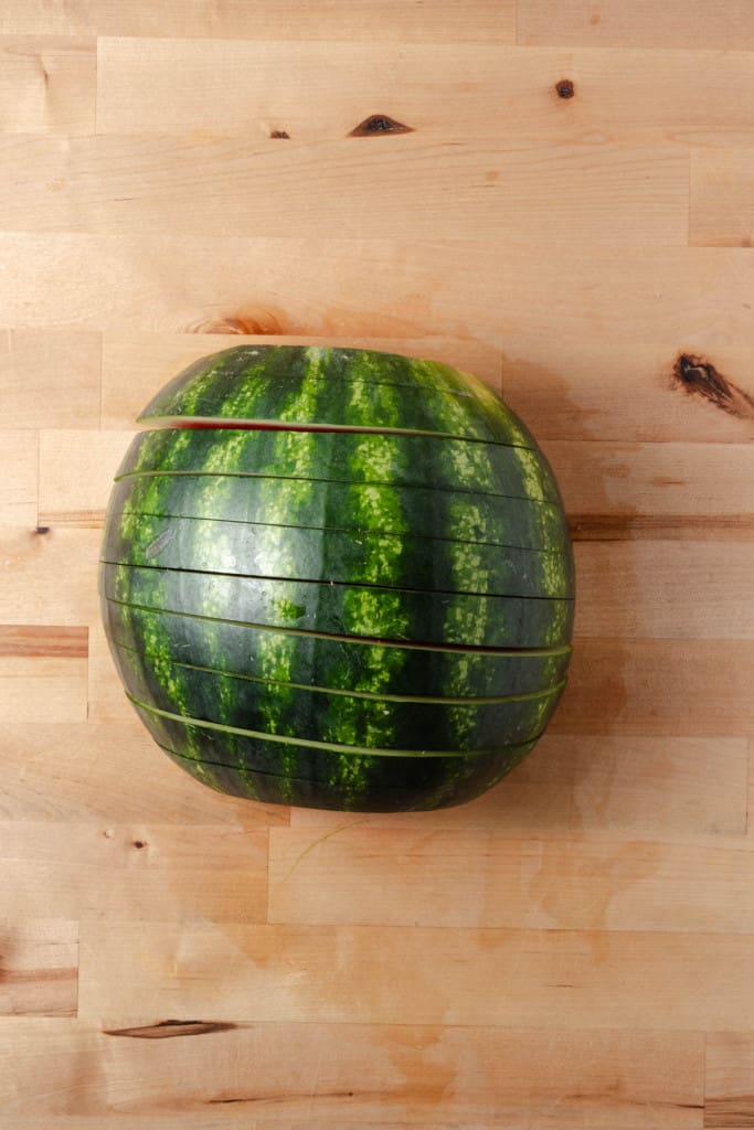 Half of a watermelon, sliced.