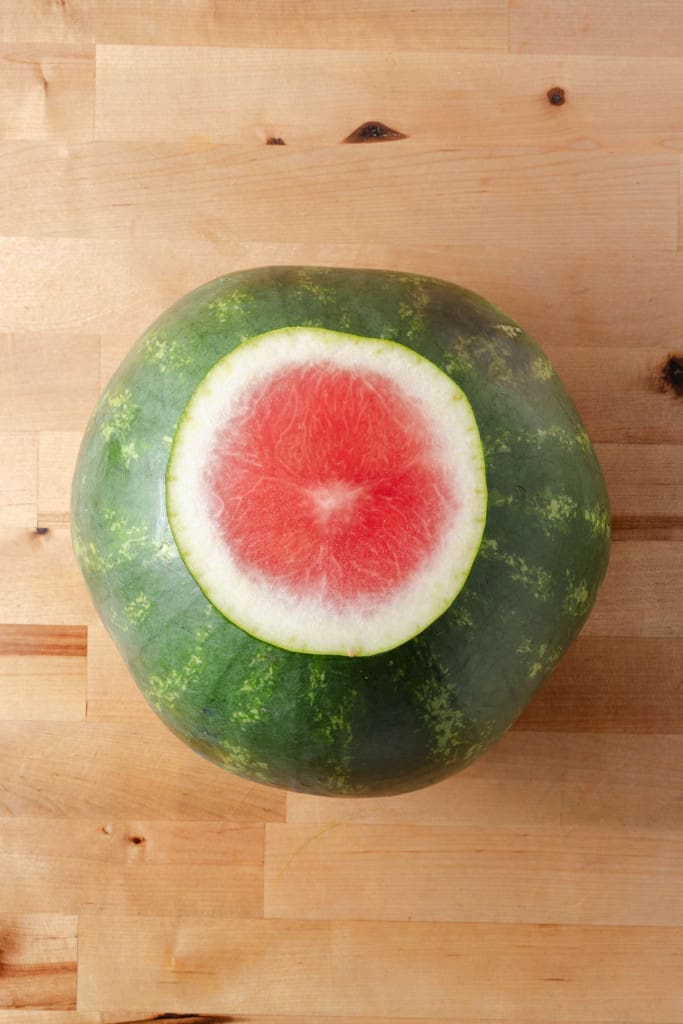 A watermelon with the end cut off.