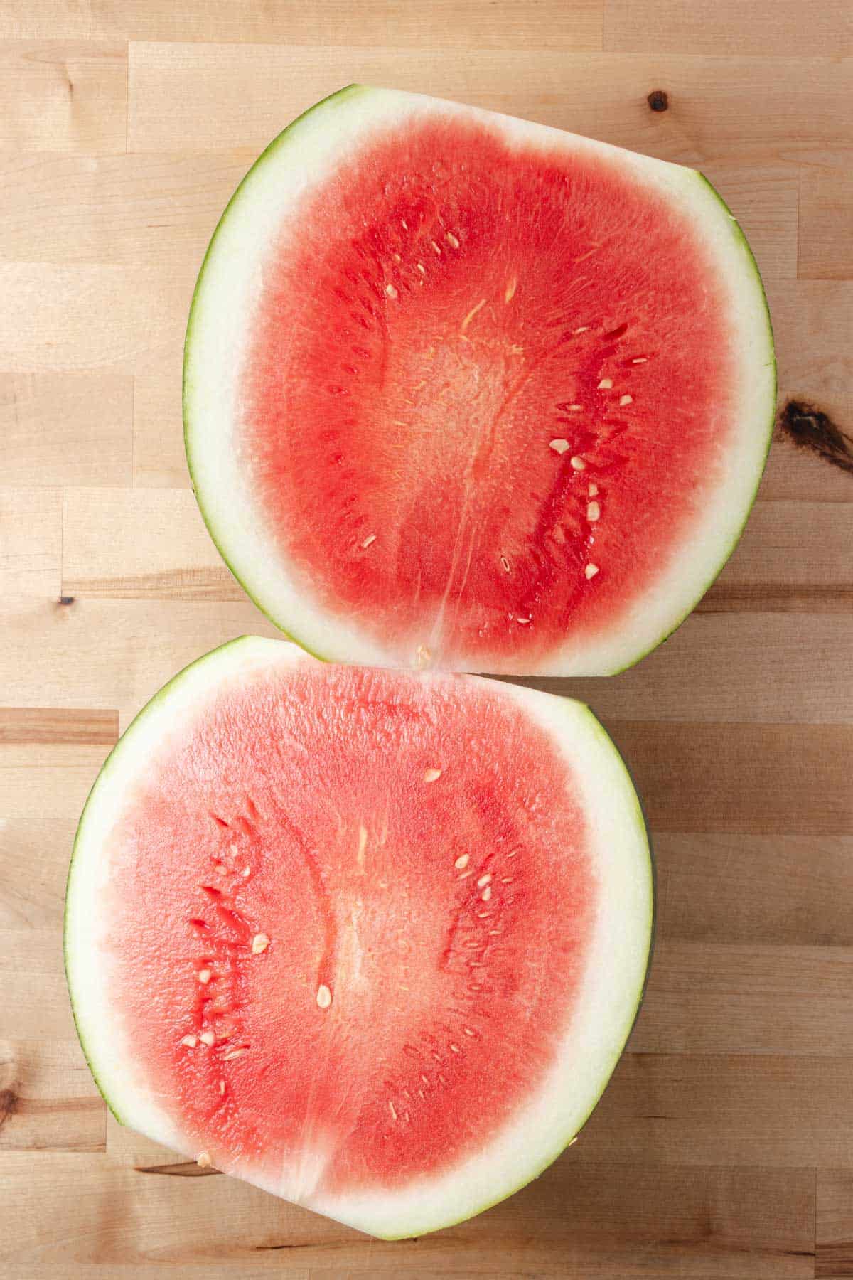 A watermelon cut in half.
