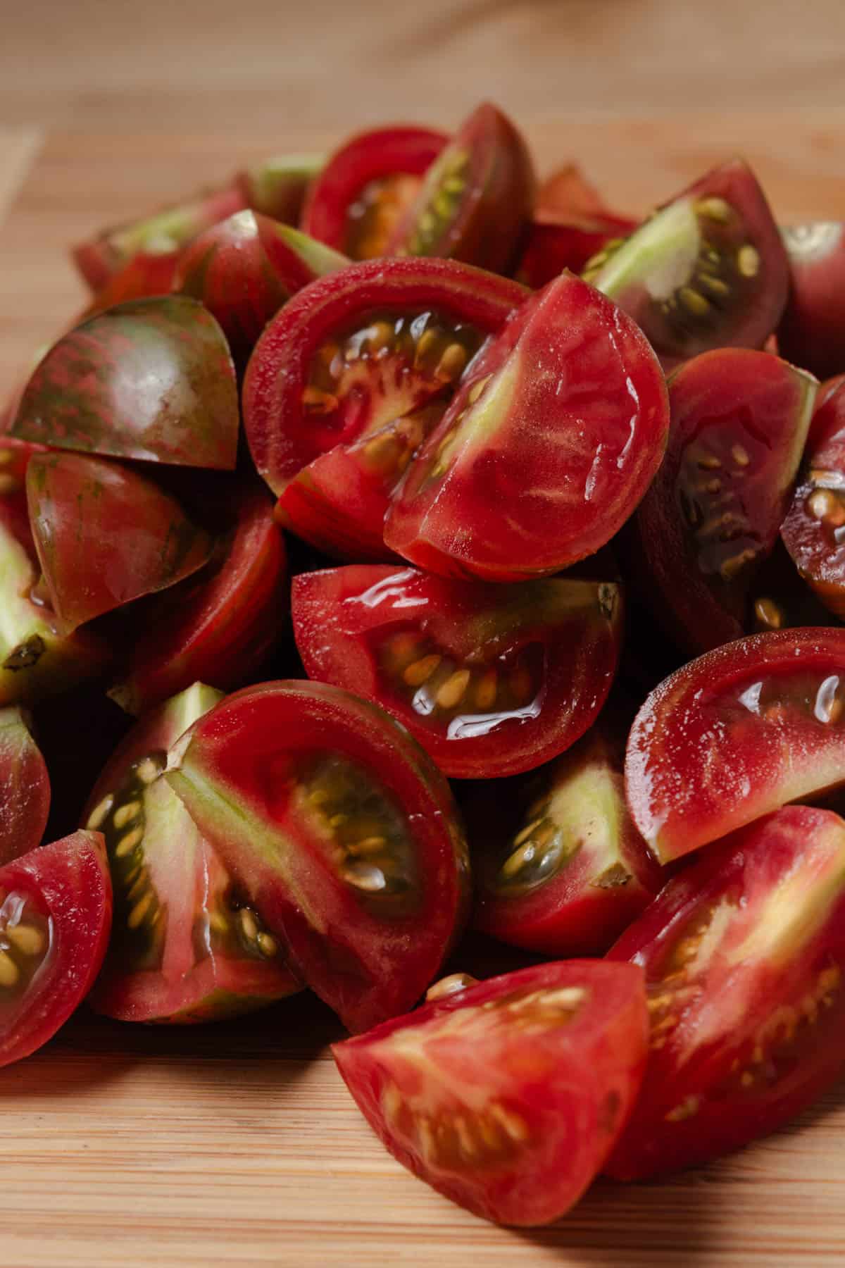A pile of quartered cherry tomatoes.