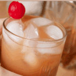 A pin depicting a apple butter bourbon cocktail.