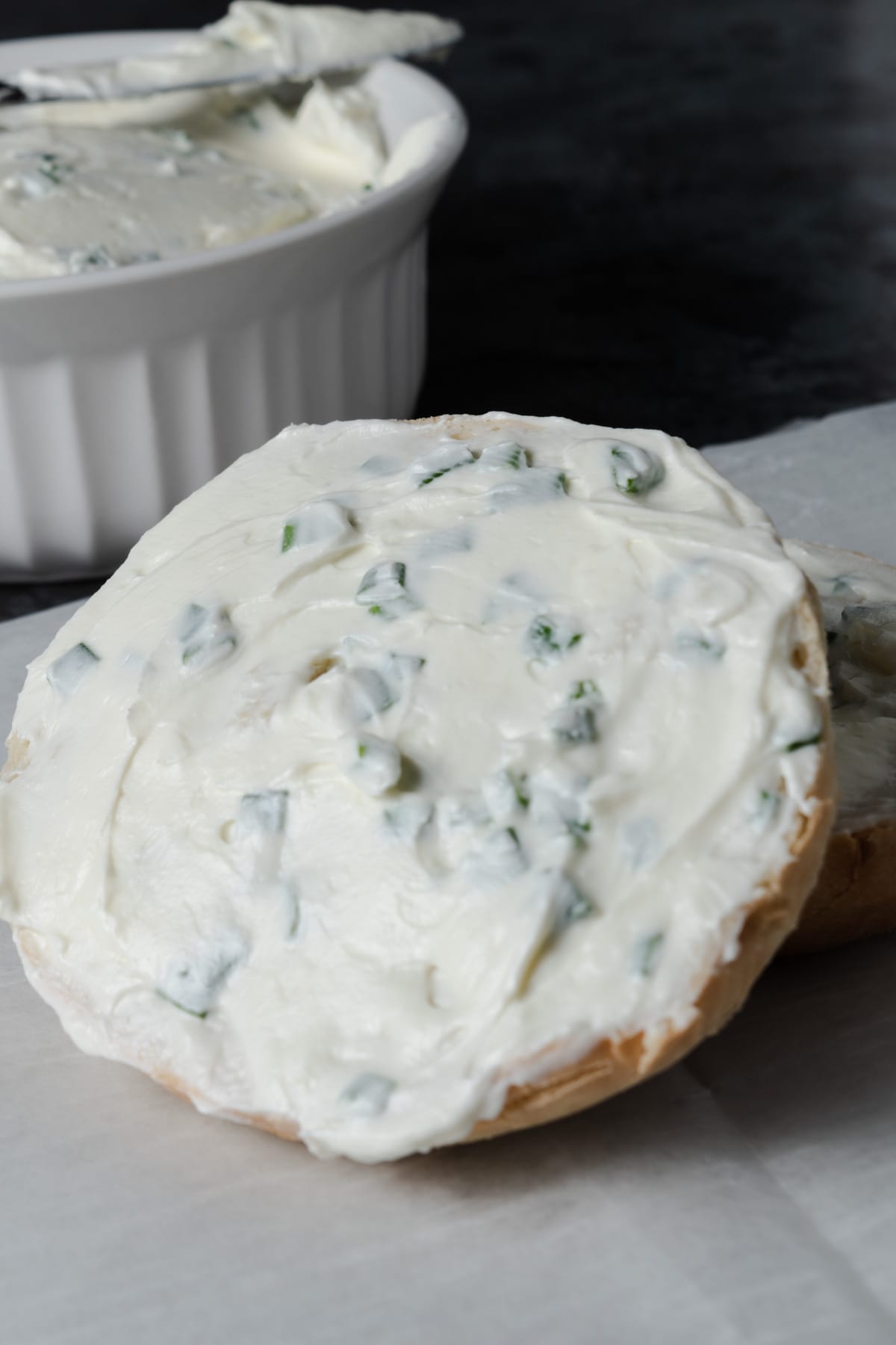Homemade scallion cream cheese schmear on a bagel.