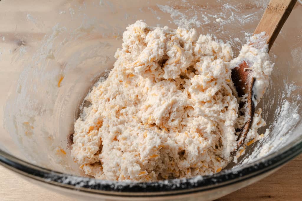 Wet dough for cheddar drop biscuits.