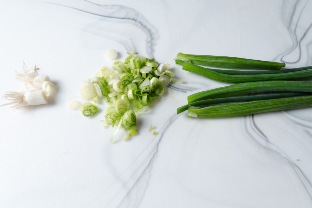 How to slice the white and light green parts of scallions.