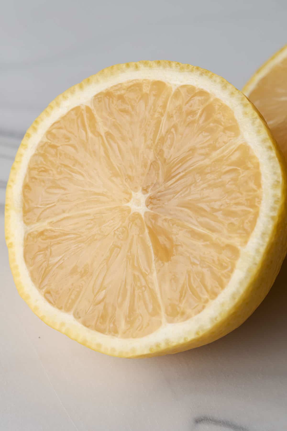 A lemon cut in half.