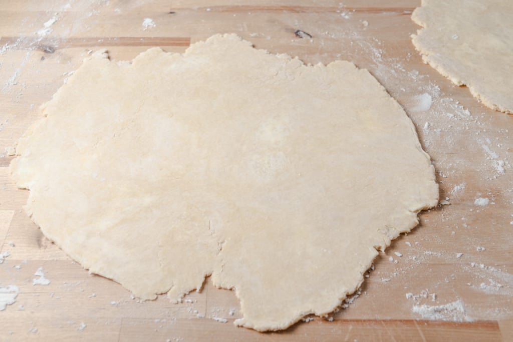 A rolled-out piece of pie dough.