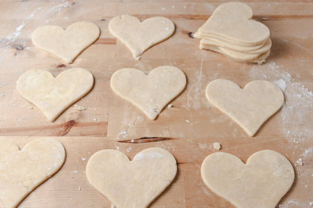 Heart-shaped pie dough cut-outs.