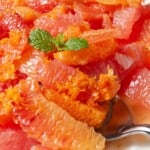 A citrus salad made from supremes of grapefruit, blood oranges, cara cara oranges, mandarin oranges, honey, and mint.