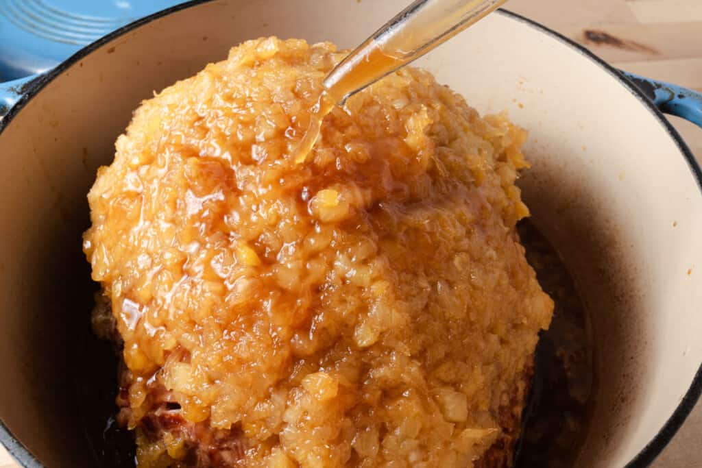 Basting a ham with a 3-ingredient glaze.