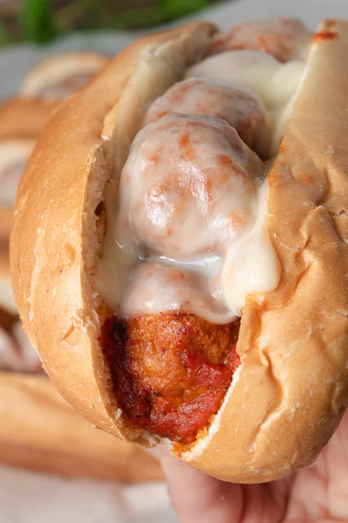 Slow cooker meatball subs made with frozen meatballs.