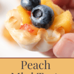 A pin depicting peach mini tarts.