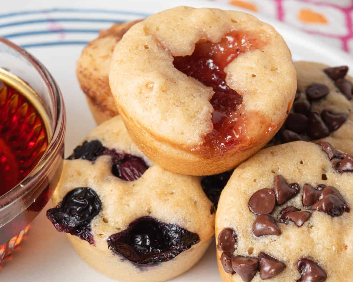 Pancake bites with blueberries, chocolate chips, and jam.