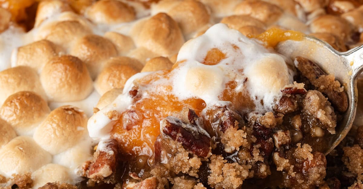 Sweet potato casserole topped with pecan topping and mini marshmallows.