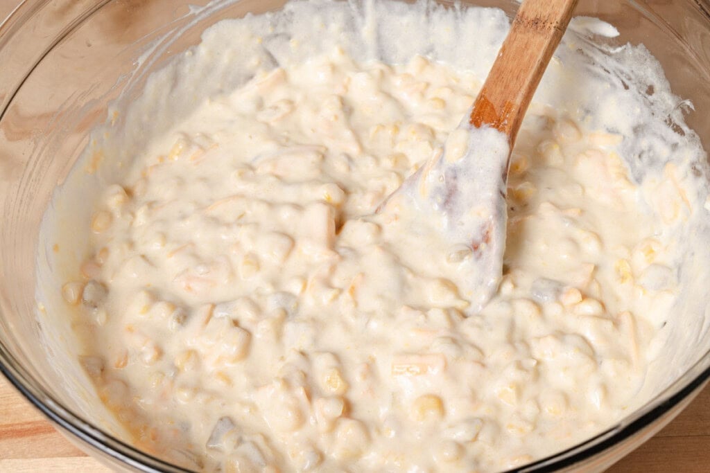 The wet ingredients for the cornbread casserole mixed together.