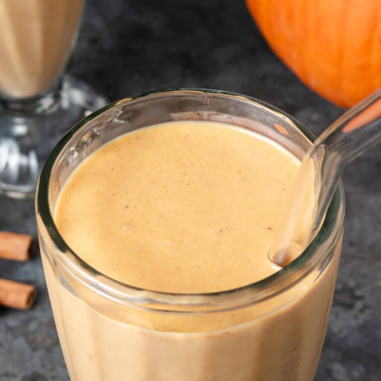 A creamy pumpkin spice smoothie with fall flavors and savory spices.