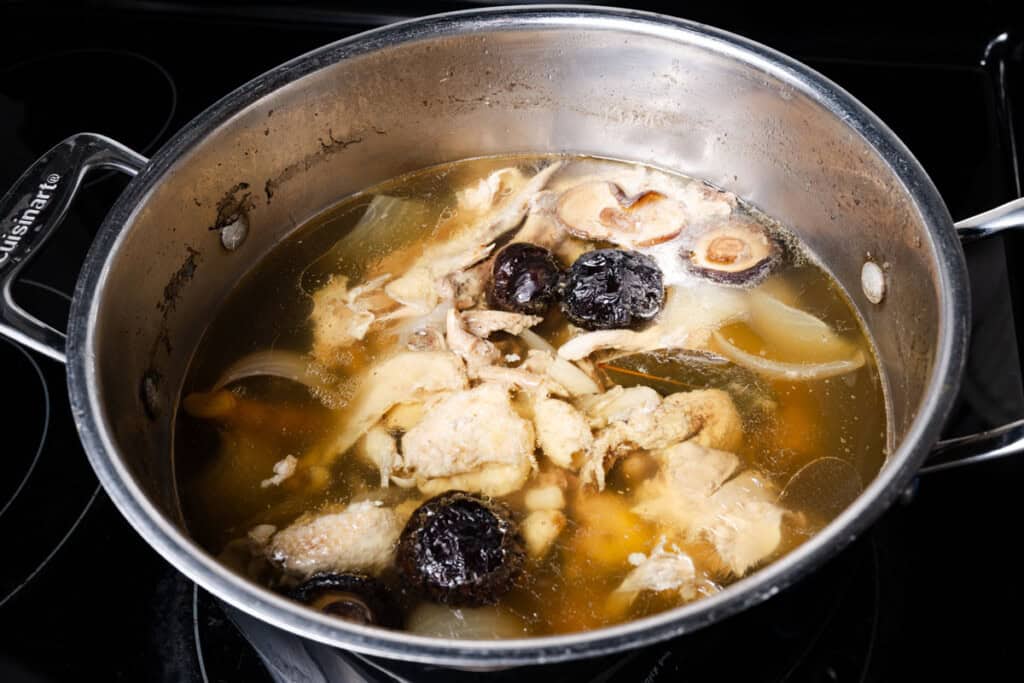 Homemade chicken stock that has finished simmering.