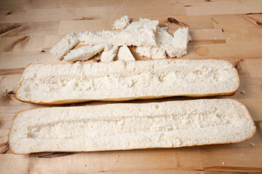 Hollowed out French bread halves.