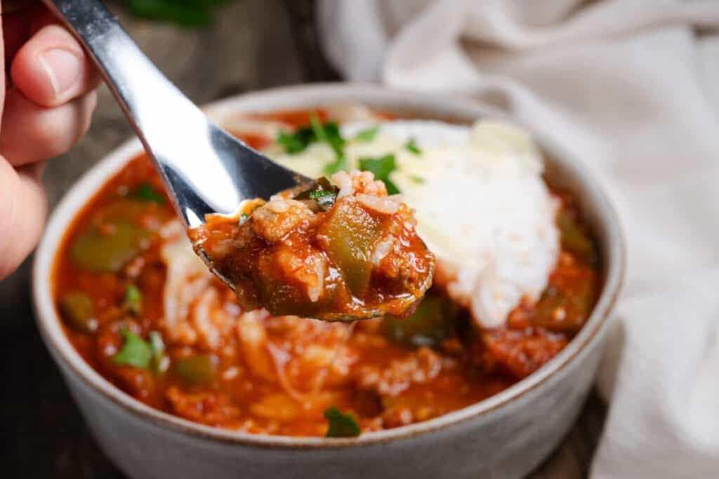 A spoonful of homemade stuffed pepper soup.